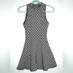 Black and white geometric sleeveless high neck above knee dress. Size S.
